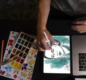 top-view-woman-drawing-ipad-scaled.jpg